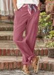 Lightweight summer women's pants by FJØRNA, high-waist, relaxed fit, breathable fabric, ideal for warm weather.