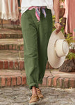 FJØRNA lightweight summer women's high waist relaxed fit breathable pantalons displayed on a model.