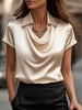 FJØRNA women's summer blouse with a cowl neck and short sleeves, stylish and lightweight top for warm weather.