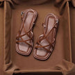 FJØRNA women's Italian leather sandals with adjustable straps and cushioned footbed, showcasing stylish open-toe design.