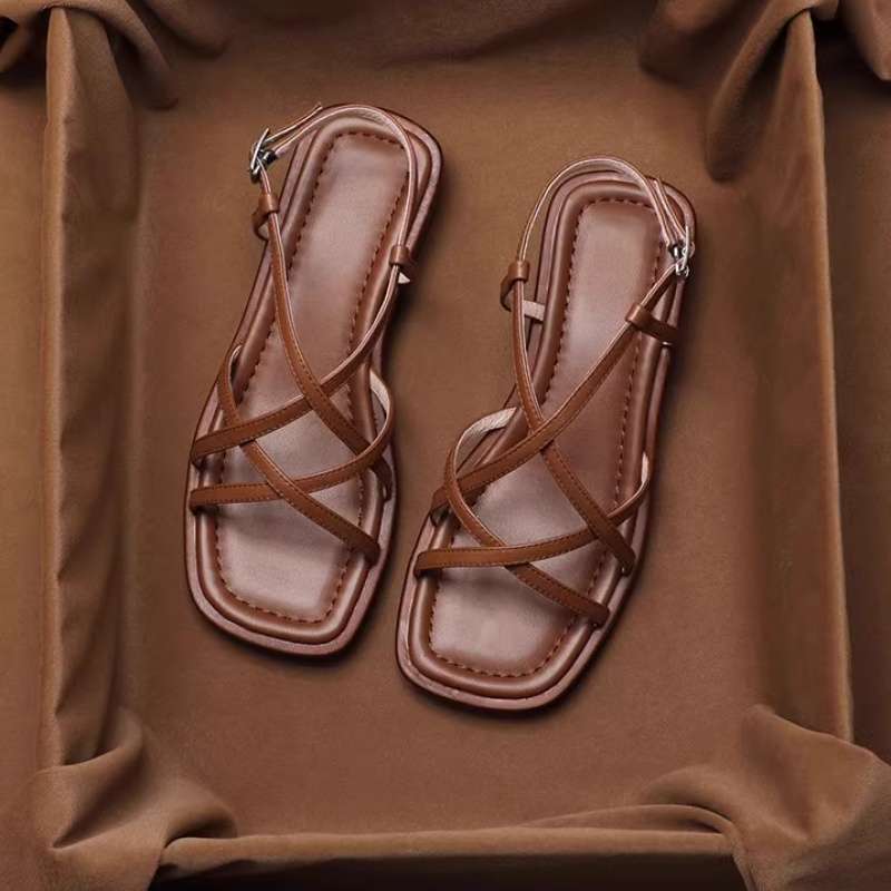 FJØRNA women's Italian leather sandals with adjustable straps and cushioned footbed, showcasing stylish open-toe design.