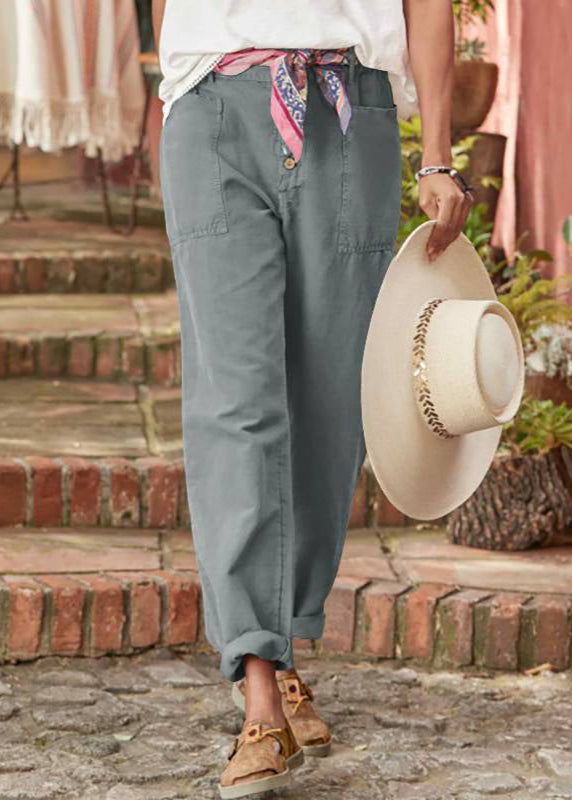 FJØRNA lightweight summer women's pantalons with high waist, relaxed fit, and breathable fabric, perfect for warm weather.