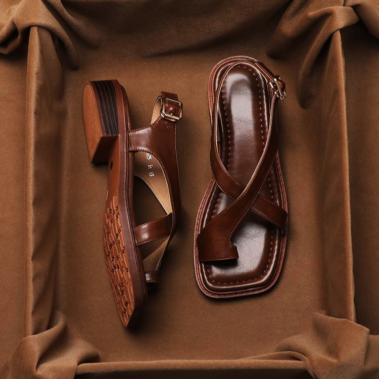 FJØRNA women's Italian leather sandals with adjustable straps and cross design, showcasing open-toe footwear for women.