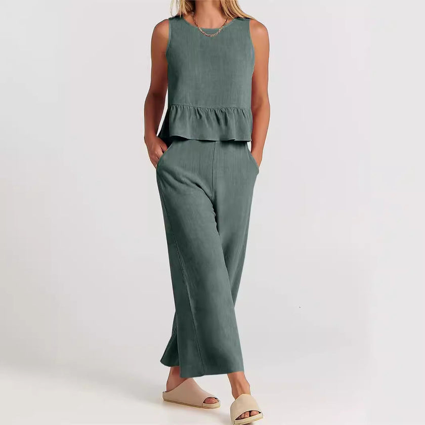 Elegant linen ruffle two-piece women's co-ord set by FJØRNA, featuring stylish ruffle details and relaxed fit.