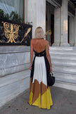 FJØRNA Polymorphic Maxi Dress in white, flowing maxi dress with elegant drape, perfect for stylish summer or formal occasions.