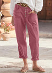 FJØRNA women's lightweight summer trousers with high waist, relaxed fit, and breathable fabric, ideal for warm weather wear.