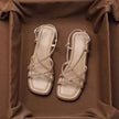 FJØRNA women's Italian leather sandals with adjustable straps and cushioned soles, showing stylish open-toe design and tan color.
