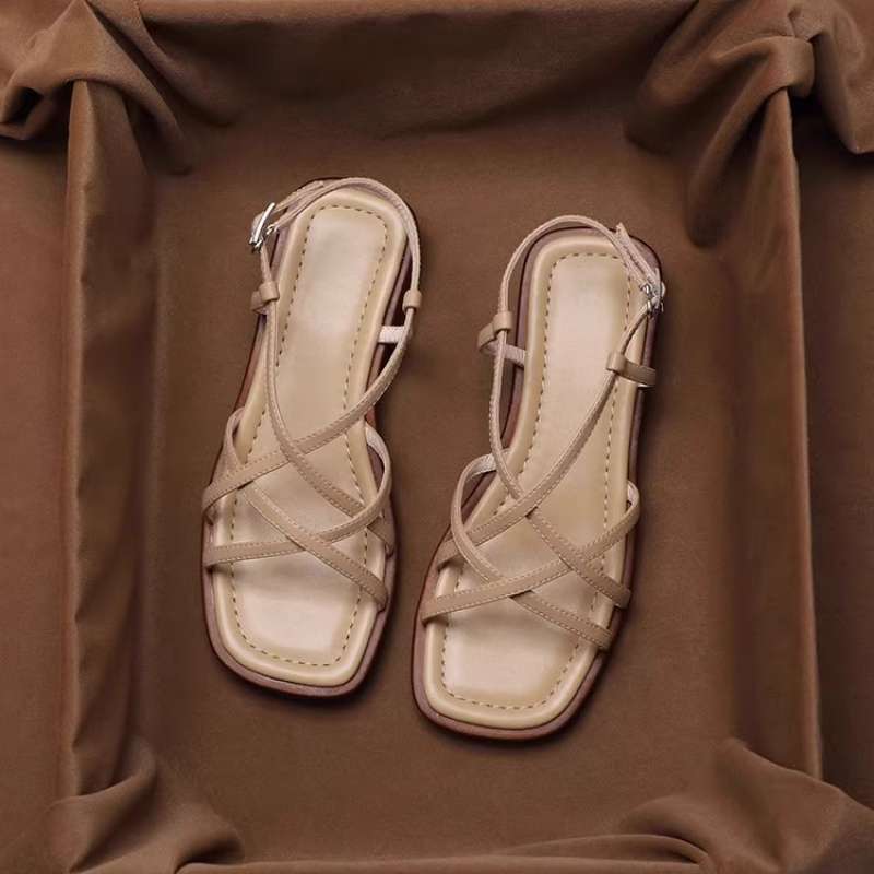 FJØRNA women's Italian leather sandals with adjustable straps and cushioned soles, showing stylish open-toe design and tan color.