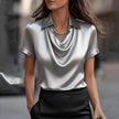 FJØRNA women's summer blouse with cowl neck and short sleeves, stylish and lightweight top for warm weather.