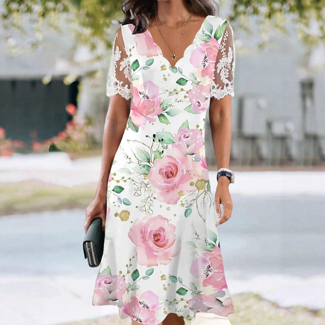 FJØRNA elegant floral midi dress for women with a V-neck, stylish and suitable for various occasions.