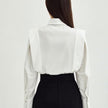 FJØRNA women's cotton blouse, stylish women's top with a relaxed fit, featuring soft fabric and a classic design.