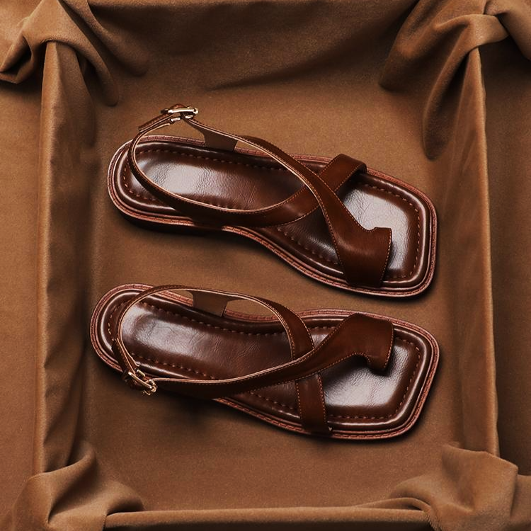 FJØRNA women's Italian leather sandals with adjustable straps and cross design, showcasing stylish footwear for women.