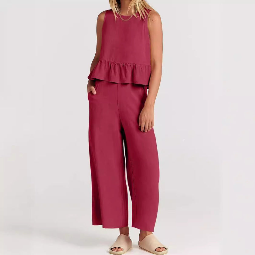 FJØRNA elegant two-piece linen ruffle co-ord set for women, featuring a stylish top and matching skirt on a white background.