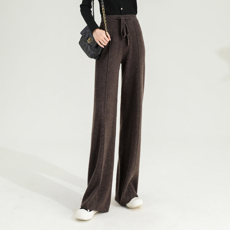 FJØRNA women's merino wool wide-leg high-waist trousers, stylish and comfortable pants for women, shown in natural fabric and fit