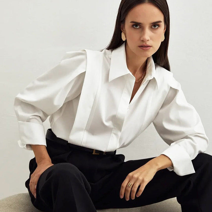 FJØRNA women’s cotton blouse, stylish tops featuring a soft fabric and classic fit, shown on a model.