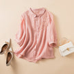 FJØRNA women's floral linen summer blouse with short sleeves and a relaxed fit, perfect for warm weather and casual outings.