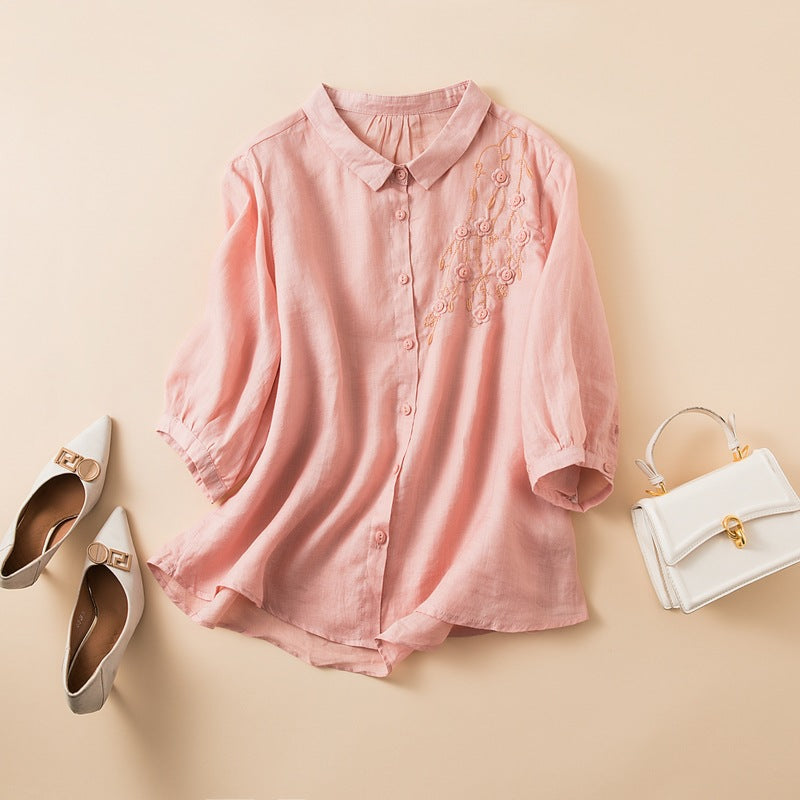 FJØRNA women's floral linen summer blouse with short sleeves and a relaxed fit, perfect for warm weather and casual outings.