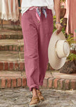 FJØRNA women's lightweight summer trousers with high waist, relaxed fit, and breathable fabric, ideal for warm weather.
