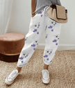 Olive green FJØRNA lightweight summer women's trousers with relaxed fit, drawstring waist, and breathable fabric.