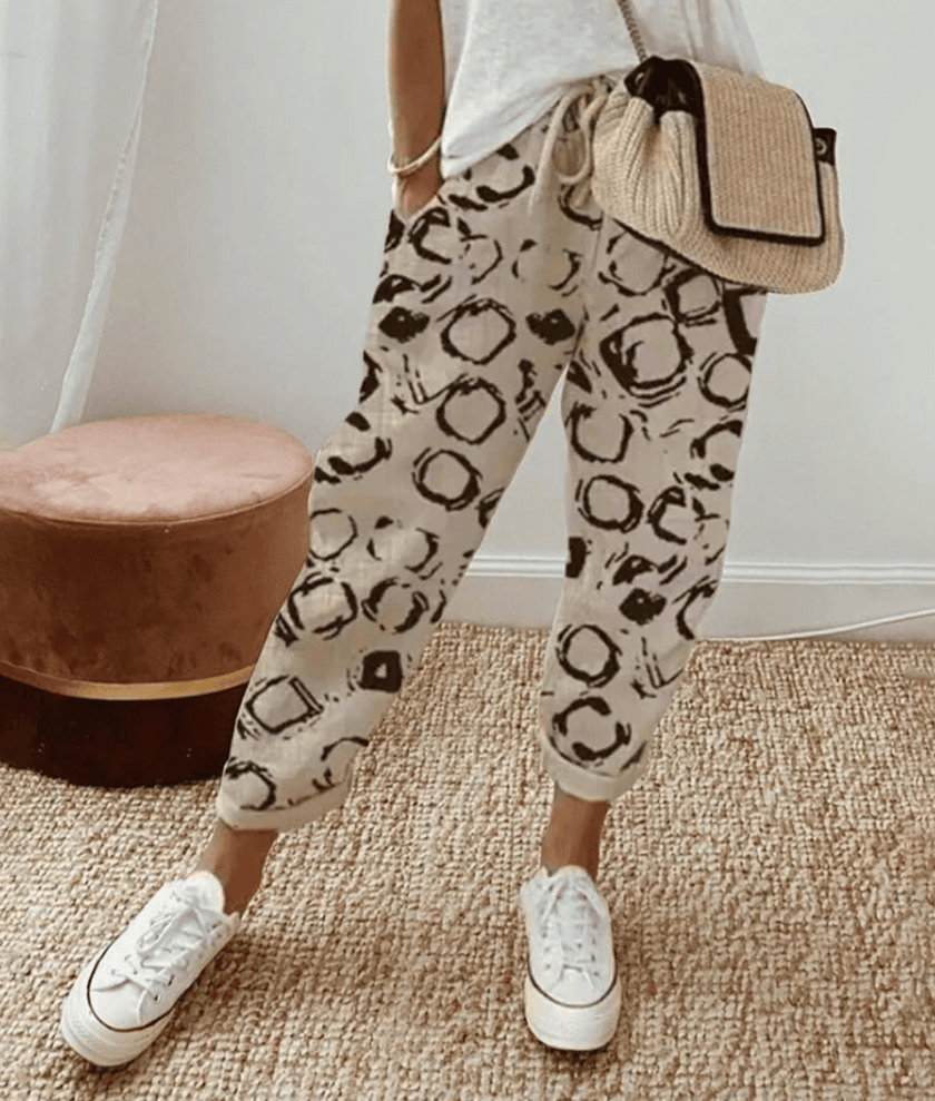 FJØRNA women's lightweight summer trousers in olive green with relaxed fit and drawstring waistband, breathable and comfortable.
