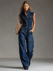 Dark blue denim sleeveless balloon jumpsuit by FJØRNA with multiple front and side pockets, relaxed fit, and stylish design.