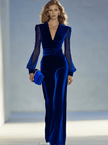 Royal blue velvet V-neck mesh long sleeve jumpsuit by FJØRNA, featuring a fitted silhouette and stylish design.