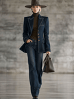 Navy topstitched denim jacket for women by FJØRNA, featuring classic design with visible stitching and a casual fit.