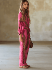 FJØRNA Rose Red Leopard Print chiffon long sleeve jumpsuit with a relaxed fit and stylish design, perfect for casual or evening wear.