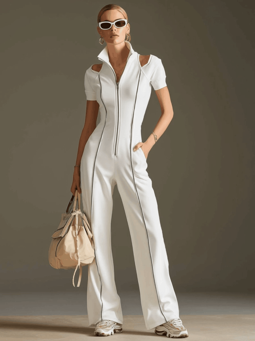 White cotton blend short sleeve wide-leg jumpsuit by FJØRNA, featuring a relaxed fit and stylish design.