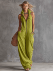 Bright green cotton linen jumpsuit by FJØRNA featuring a zip-front design and sleeveless style.
