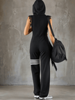 Black striped sleeveless hooded jumpsuit by FJØRNA, featuring a casual fit and stylish design, shown in the product image.