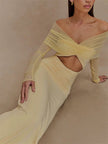 FJØRNA off-shoulder cut-out maxi dress featuring a flowing silhouette and stylish neckline, perfect for summer occasions.
