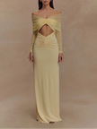 FJØRNA off-shoulder cut-out maxi dress featuring a flowing silhouette and stylish shoulder cut-outs, perfect for summer occasions.