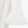 FJØRNA off-shoulder lace maxi dress for women, elegant evening and formal wear with detailed lace fabric and flowing silhouette.