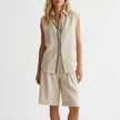 FJØRNA relaxed sleeveless button-up shirt and wide-leg pleated shorts set in off-white, casual summer 2-piece outfit.