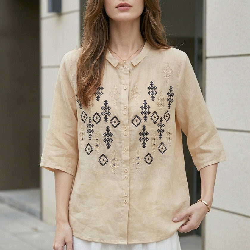 Off-white FJØRNA summer blouse for women with geometric button front and relaxed fit, stylish top for warm weather.