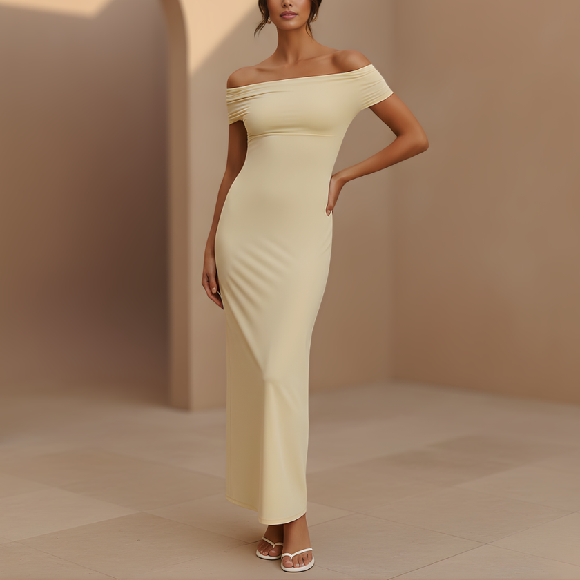 FJØRNA yellow maxi dress for women featuring off-shoulder Bardot style with backless design and ruched detailing.