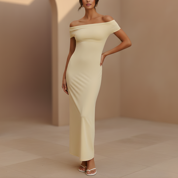 FJØRNA yellow maxi dress for women featuring off-shoulder Bardot style with backless design and ruched detailing.