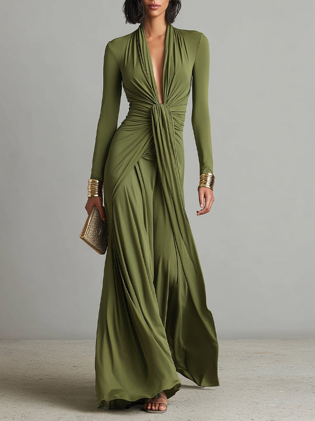 Olive silk V-neck maxi dress for women by FJØRNA, flowing fabric, elegant design, and V-neckline shown in the image.