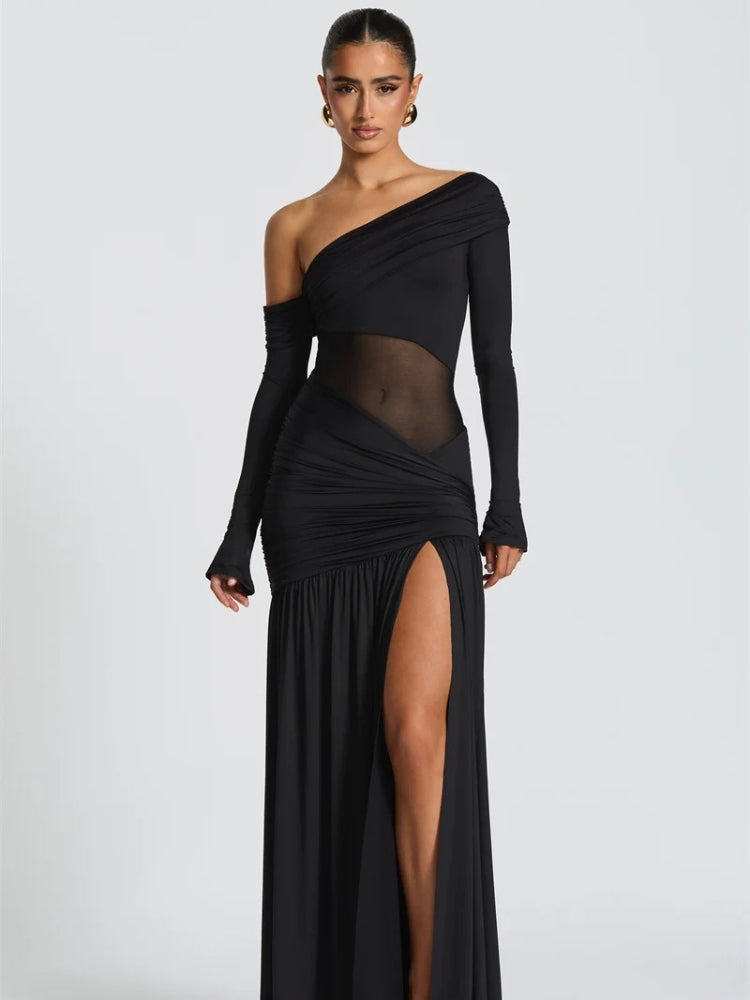 FJØRNA one-shoulder high-slit women's maxi dress perfect for summer and special occasions, shown in a flowing fabric with elegant design.