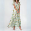 Elegant mini dress for women by FJØRNA, featuring a flowy design suitable for evening and special occasions.