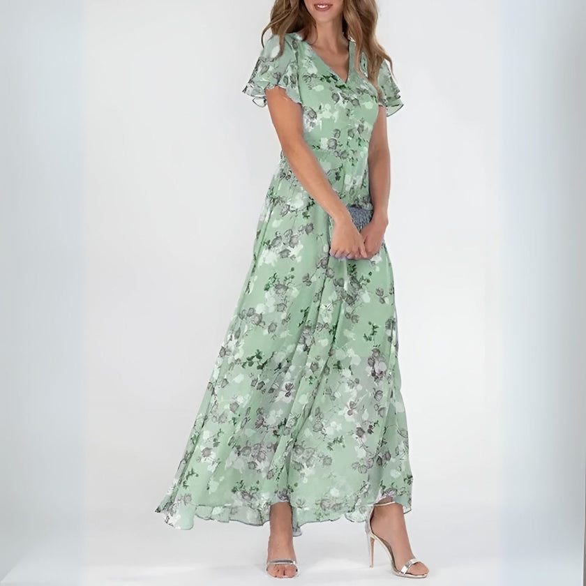 Elegant mini dress for women by FJØRNA featuring a flowy evening design, perfect for stylish occasions.