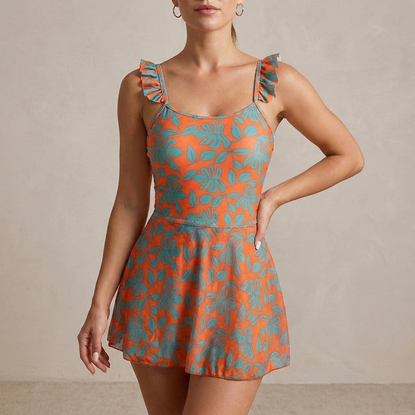 Orange and green ruffle floral summer swimsuit for women by FJØRNA, featuring a stylish and vibrant swimwear design.