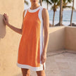 Orange women's summer two-piece A-line co-ord set by FJØRNA, featuring a stylish coordinated top and skirt ensemble.