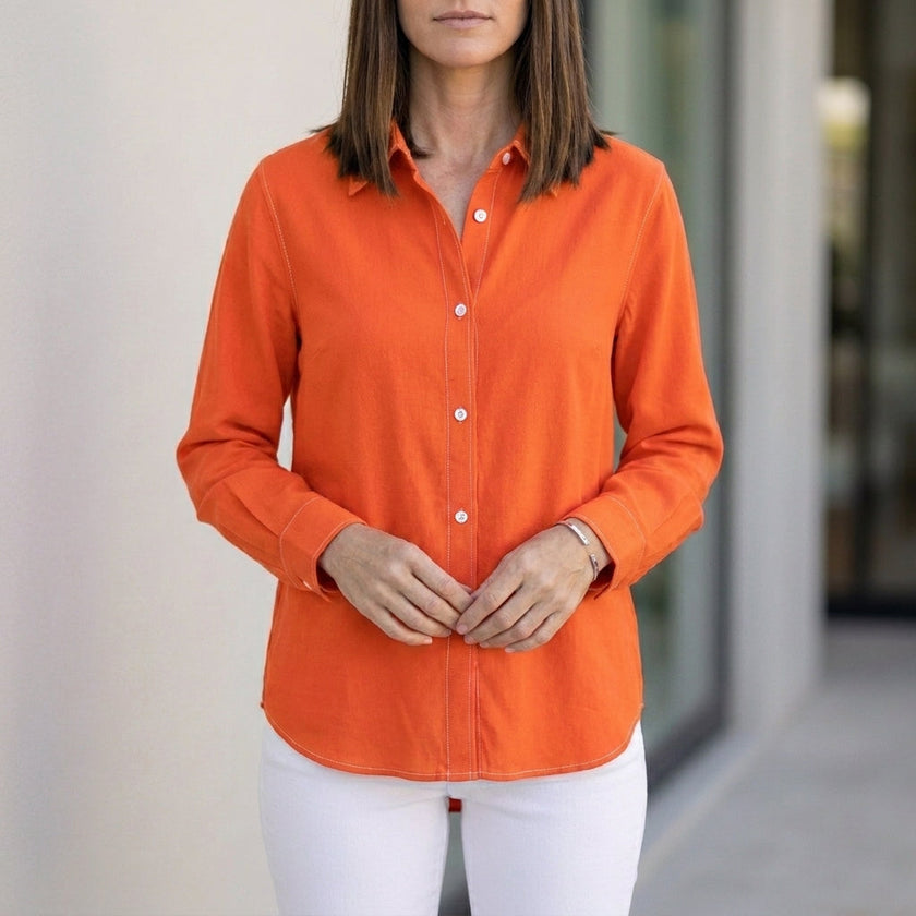 Orange linen summer blouse for women by FJØRNA featuring button front and relaxed fit, casual top for warm weather.