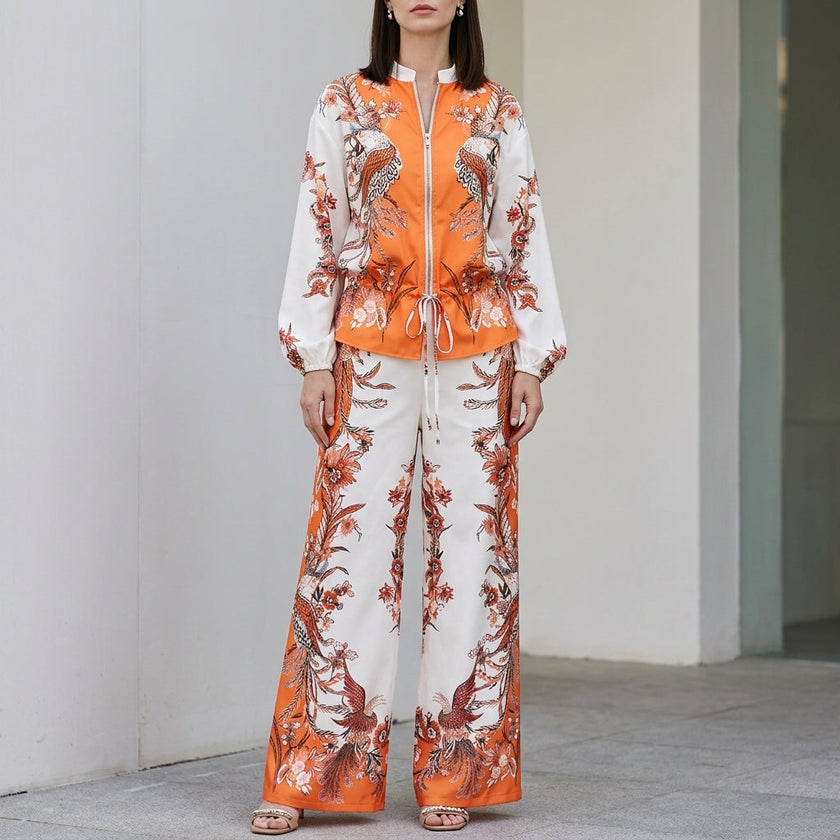 FJØRNA botanical zip-front top and wide-leg pants in orange, stylish 2-piece set with floral print and comfortable fit.