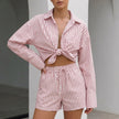 Orange FJØRNA women's summer two-piece co-ord set with striped pattern and drawstring details, perfect for warm weather.