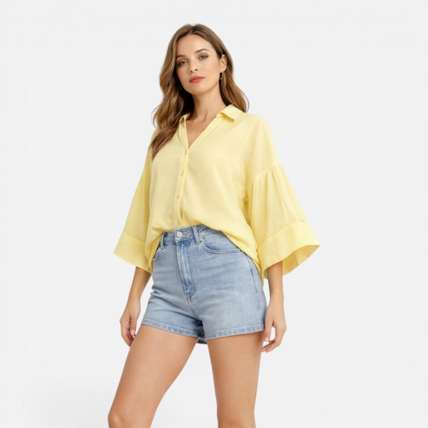Lightweight women's summer blouse by FJØRNA, loose fit vacation shirt, featuring breathable fabric and relaxed style.