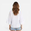 FJØRNA women's lightweight summer blouse, loose fit vacation shirt with relaxed style, shown in oversized fit on model.