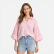 Lightweight women's summer blouse by FJØRNA, loose fit vacation shirt with relaxed style, shown in oversized fit image.